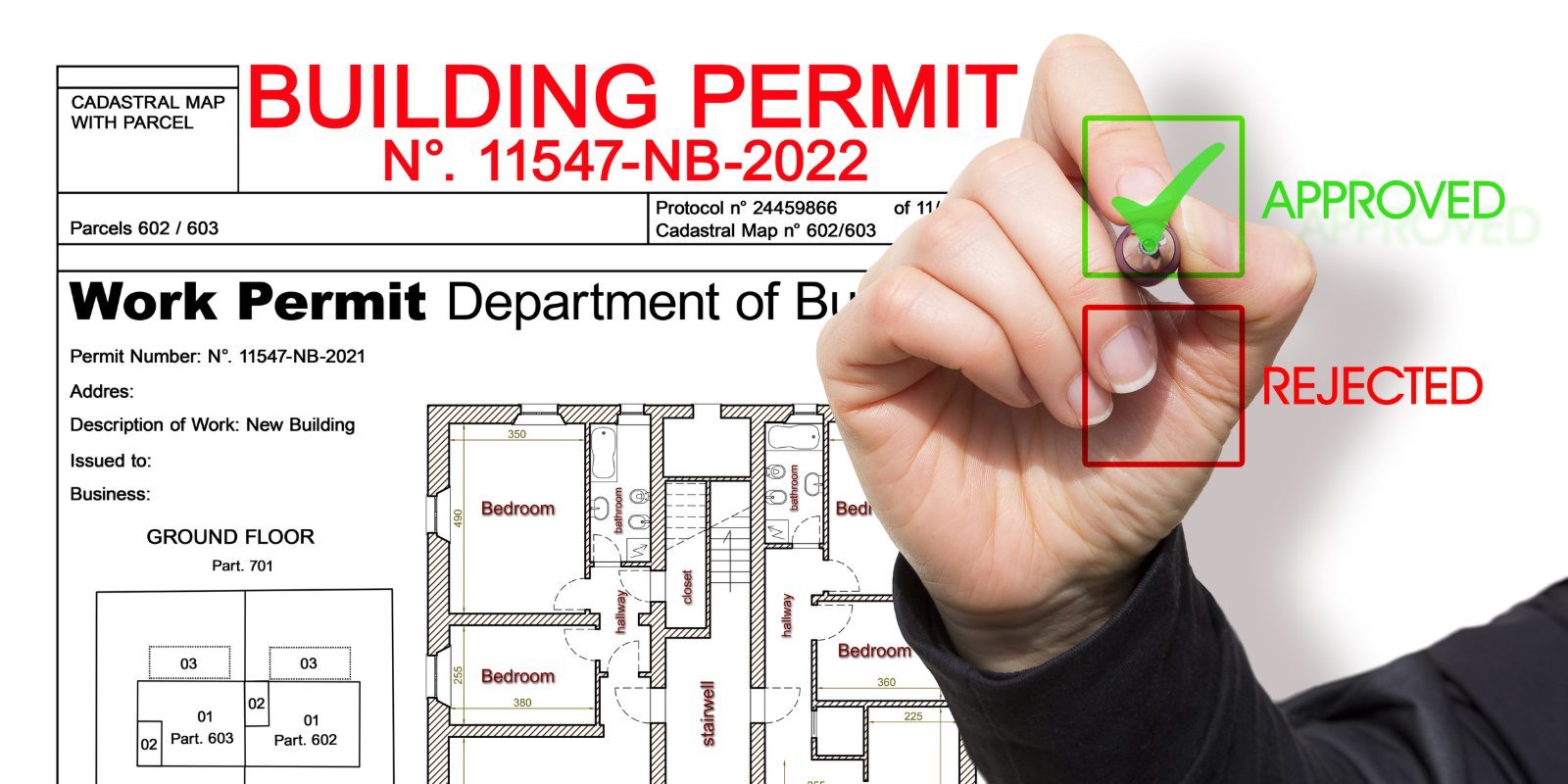 A hand marking an approval checkbox on a permit application beside a floor plan.
