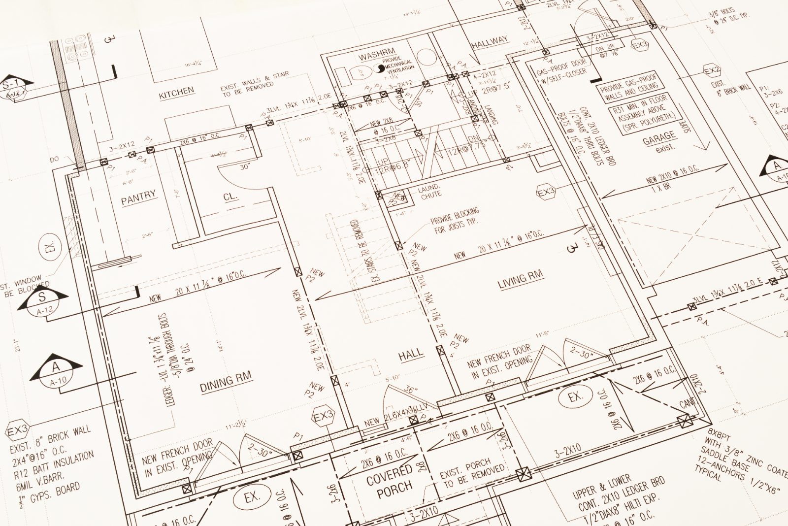 Close view of an architectural floor plan with dimensions, framing notes and callouts.